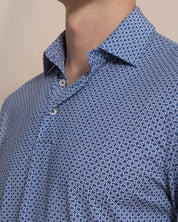 Driver Weaving Around Printed Polo